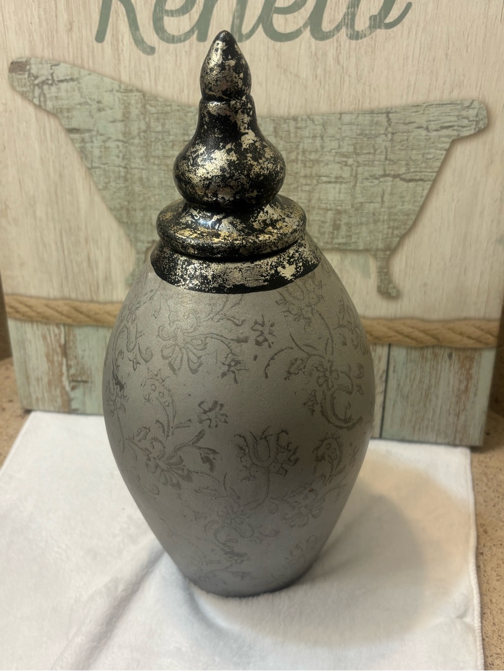 Decorative Gray and Gold Accent Jar with Ornate Lid